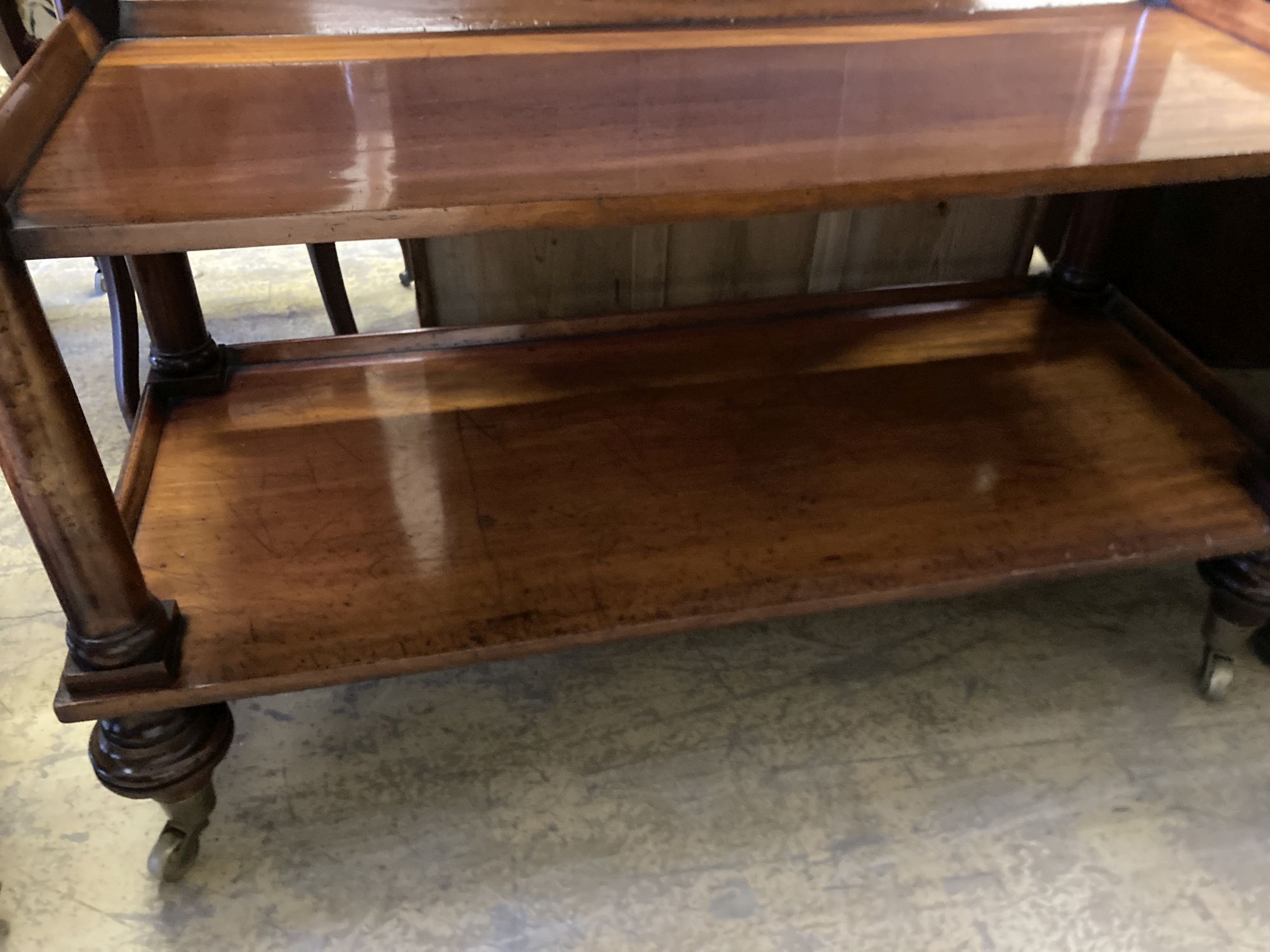 A Victorian mahogany three tier buffet, length 122cm, depth 53cm, height 110cm